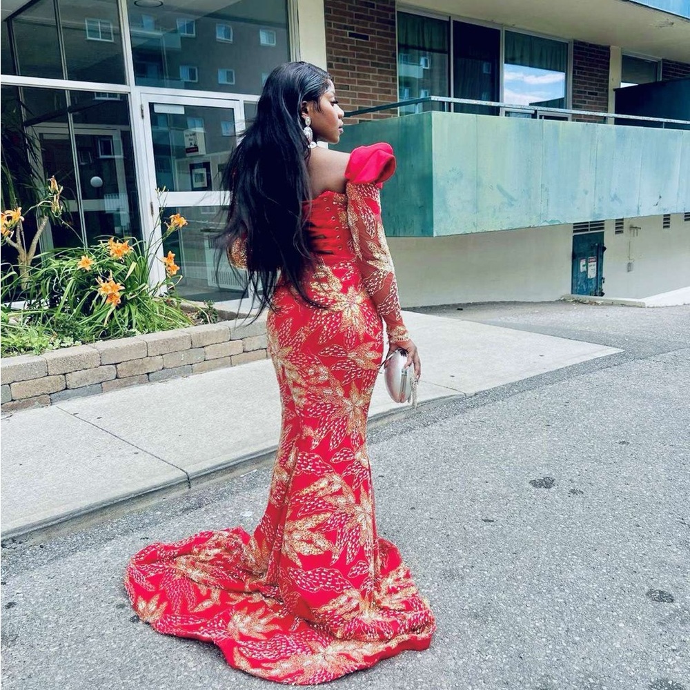A beautiful red wedding guest dress made from African